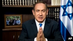 PM Israel Benjamin Netanyahu berbicara lewat satelit dalam konferensi kebijakan tahunan “American Israel Public Affairs Committee AIPAC di Washington DC, hari Senin (27/3).