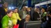 FILE - Deputy President Cyril Ramaphosa, seated, and African National Congress party members discuss municipal election results at the results center in Pretoria, South Africa, Aug. 5, 2016.