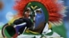A South African soccer fan blows a vuvuzela in Pretoria during World Cup play, June 16, 2010