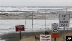 Waves common for a stormy springtime day crash into the beach in Moclips, Washington, March 11, 2011. A tsunami caused by an earthquake in Japan reached the west coast of the U.S. early Friday, though its impact was minimal.