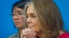 FILE - Gloria Steinem, right, and Christine Ahn of of WomenCrossDMZ listen during a U.N. news conference announcing plans for a women's walk across the demilitarized zone between North and South Korea to call for reunification, March 11, 2015. 