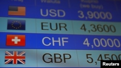 Rates of currencies, including British Pound, are displayed after Brexit referendum. June 24, 2016 (Reuters)