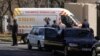 An ambulance transporting former South African president Nelson Mandela arrives at the home of the former statesman in Johannesburg, South Africa, Sept. 1, 2013.
