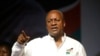 FILE - Ghana Incumbent President, John Dramani Mahama candidate of the National Democratic Congress gesture to his supporters during a presidential election rally at Accra Sports Stadium in Accra, Ghana, Dec. 5, 2016. 