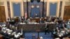 In this image from video, Kenneth Starr, an attorney for President Donald Trump, walks up to the podium during Trump's impeachment trial in the Senate at the Capitol in Washington, Jan. 27, 2020.