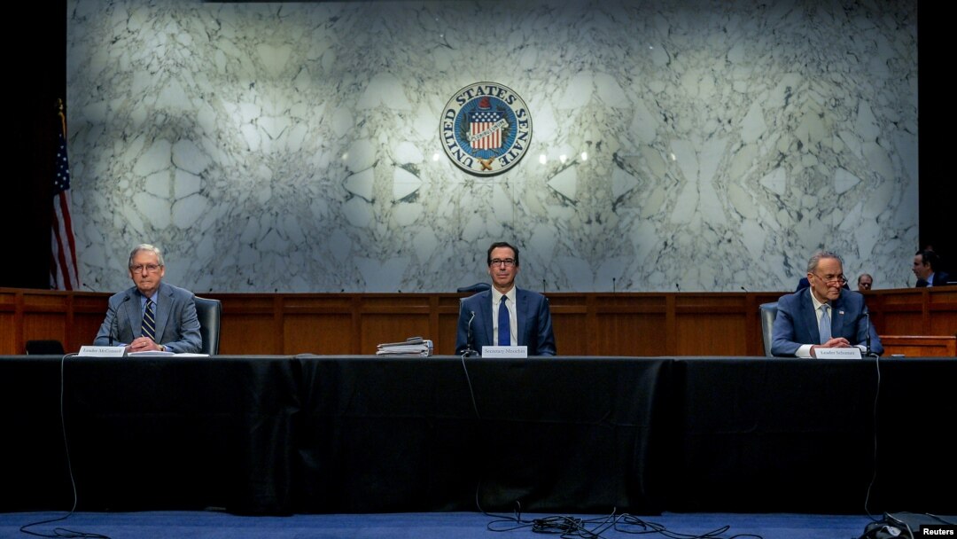 U.S. Senate Majority Leader Mitch McConnell, and U.S. Senate Minority Leader Chuck Schumer meet with Treasury Secretary Steve Mnuchin (C) to work on coronavirus economic aid legislation, on Capitol Hill, in Washington, March 20, 2020.