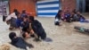 Flooding Kills Scores in India, Pakistan