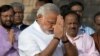 Indian Prime Minister-designate and Hindu nationalist Bharatiya Janata Party leader Narendra Modi pays his respects at Rajghat, the memorial of Mahatma Gandhi, in New Delhi, May 26, 2014.