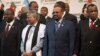 Sudanese president Omar al-Bashir, 2nd from right, stands with other African leaders during a photo op at the AU summit in Johannesburg, June 14, 2015.