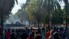 Para mahasiswa yang berunjuk rasa bentrok di Kendari, Sulawesi Tenggara, 26 September 2019. (Foto: AP)