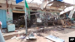 The wreckage of a bus remains at the site of an airstrike in Saada, Yemen, on Aug. 10, 2018. Yemen's Shiite rebels are backing a U.N. call for an investigation into a Saudi-led coalition airstrike in the country's north that killed dozens of people the previous day, including many children.