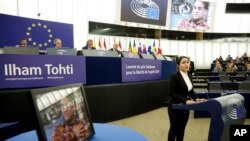 Jewher Ilham, daughter of imprisoned Uighur scholar Ilham Tohti speaks during the Sakharov Prize ceremony at the European Parliament, in Strasbourg, eastern France, Dec. 18, 2019. 