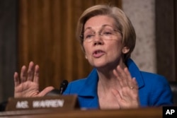 Senate Armed Services Committee member Sen. Elizabeth Warren questions Defense Secretary-designate James Mattis on Capitol Hill, during the panel's confirmation hearing for Mattis, Jan. 12, 2017.