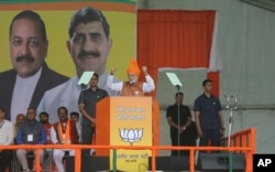 Indian Prime Minister Narendra Modi addresses an election rally at Dumi village in Akhnoor, about 20 kilometers from Jammu, India, March 28, 2019.