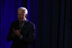 FILE - Democratic presidential candidate Joe Biden listens to a story from an attendee at the We Decide: Planned Parenthood Action Fund 2020 Election Forum to Focus on Abortion and Reproductive Rights event in Columbia, South Carolina, June, 22 2019.