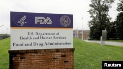FILE - Signage is seen outside of the Food and Drug Administration (FDA) headquarters in White Oak, Maryland, Aug. 29, 2020. 