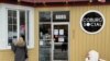 Customers line up in front of Halifax cafe Coburg Social, which has maintained a take-out window throughout the pandemic. (Jay Heisler/VOA)