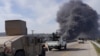 Dema hêzên Sûrî di wesayîtekê de, dijî serhildaneke nû ya ji alîyê çekdarên Elewî şer dikin, Lazqîyê, Sûrîyê 7ê Adar, 2025.