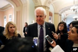Senate Majority Whip John Cornyn of Texas pauses as he talks with reporters on Capitol Hill in Washington, D.C., Jan. 3, 2017, as the 115th Congress begins.