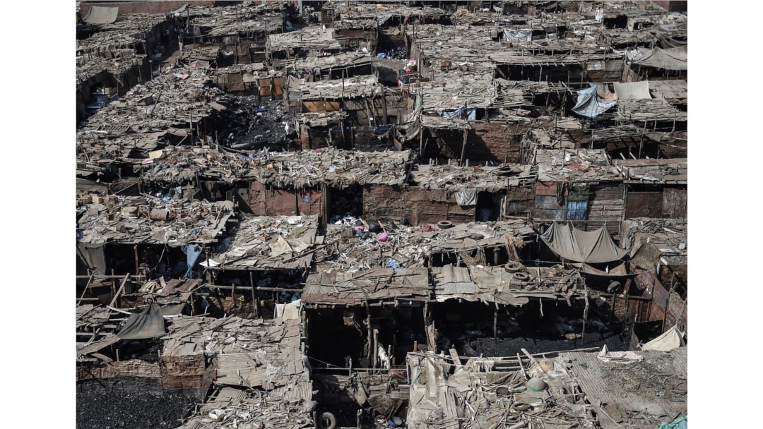 FILE - A general view of Ezbet al-Nakhl, a shanty town north of the Egyptian capital Cairo, is seen Oct. 13, 2018.