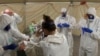 Australian Police Seize Evidence from Country’s Biggest Source of Coronavirus Infections 