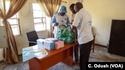 Officials from the Nigerian government's anti-trafficking agency are gathering pamphlets to distribute to the public.