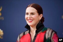 FILE - Megan Mullally arrives at the 70th Primetime Emmy Awards at the Microsoft Theater in Los Angeles, Sept. 17, 2018.