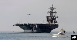 FILE - The USS Carl Vinson