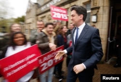Britain's opposition Labour Party leader Ed Miliband leaves after a campaign event in Colne, northern England, May 6, 2015.