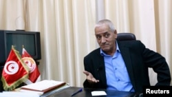 FILE - Hussein Abassi, head of Tunisia's UGTT union federation