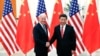 Chinese President Xi Jinping (R) shakes hands with US Vice President Joe Biden (L) inside the Great Hall of the People in Beijing on December 4, 2013 AFP PHOTO / POOL (Photo by LINTAO ZHANG / POOL / AFP)