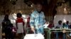 Presidential candidate Jose Mario Vaz casts his ballot at a polling station in Bissau, April 13, 2014. 