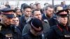Police officers attend a vigil for victims of a fatal attack on London Bridge in London, Britain, Dec. 2, 2019.