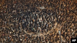 Thousands of protesters turn out outside government headquarters in Hong Kong, September 7, 2012, to protest against the government's plan to introduce a new subject "Moral and National Education" into a new curriculum. 
