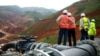 FILE - Employees stand in an open pit at Banro's Twangiza mine in eastern Congo.