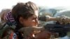 Kurdish Women Battle IS With Songs — and Machine Guns
