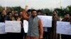 Supporters of the Pashtun Tahafuz Movement (PTM) chant slogans against the murder of a senior police officer after he disappeared from Pakistan's capital city last month, during a protest in Islamabad, Pakistan Nov.15, 2018. 