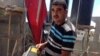 Anwar Mohammed holds part of a rocket that destroyed his family's home in Gaza during Israel's Operation Protective Edge targeting Palestinian militants. (srael's Operation Protective Edge targeting Palestinian militants. (VOA / Gabe Joselow)