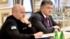 FILE - Ukraine's President Petro Poroshenko, right, and Oleksandr Turchynov, Head of Ukraine's Security and Defense Council, chair a council session in Kyiv, Ukraine, Aug. 11, 2016. Poroshenko on Tuesday ordered an official inquiry into whether any Ukraine-made missile engine technology could have been supplied to North Korea.