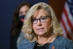Rep. Liz Cheney, R-Wyo., the House Republican Conference chair, speaks with reporters following a GOP strategy session on Capitol Hill in Washington, April 20, 2021.