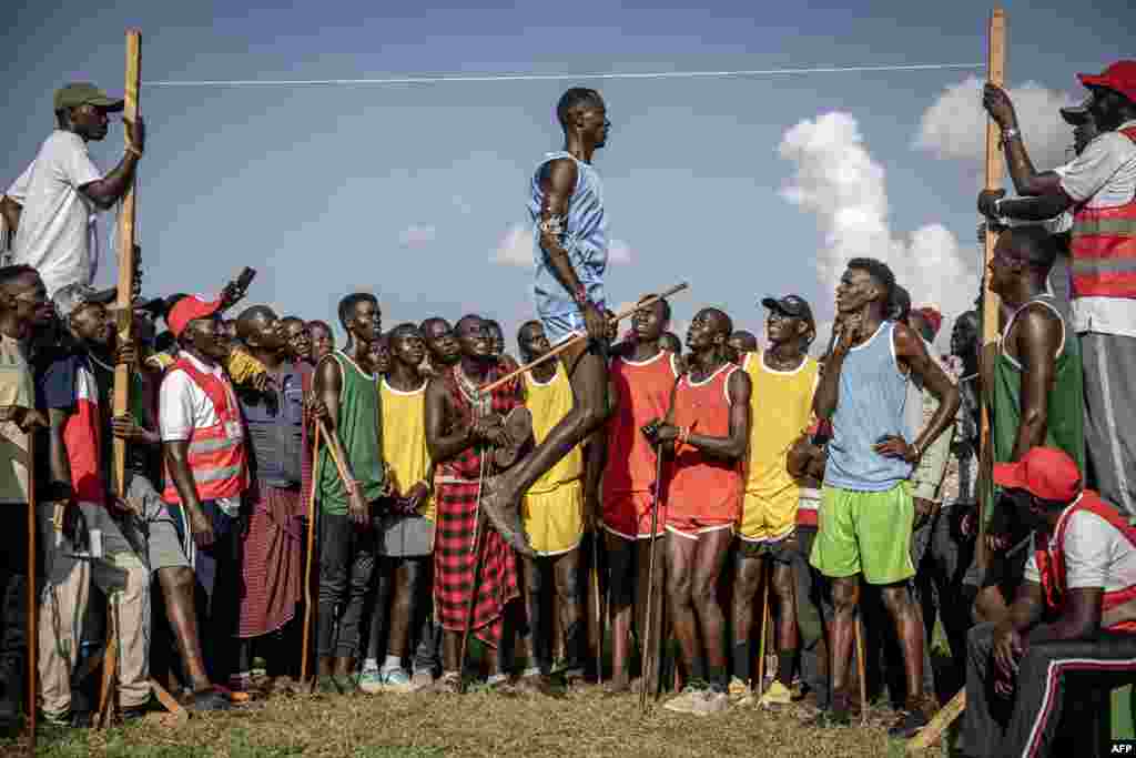 A Maasai athlete competes in the men's traditional Maasai jumping competition during the Maasai Olympics 2024 in Kimana, Kenya, Dec. 14, 2024.