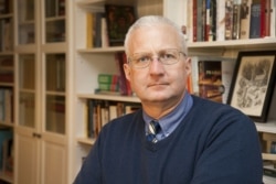 FILE - David Whelan, brother of Paul Whelan, poses in his house in Newmarket, Ontario, Canada, Jan. 5, 2019.