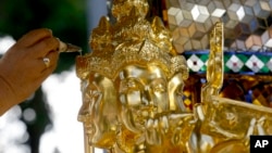 Sebuah upacara Hindu di Bangkok, Thailand, Jumat (4/9).