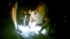 A video image from a helmet camera shows U.S. and Iraqi special forces freeing hostages from a prison controlled by Islamic State militants in the town of Huwija, Iraq, Oct. 22, 2015.