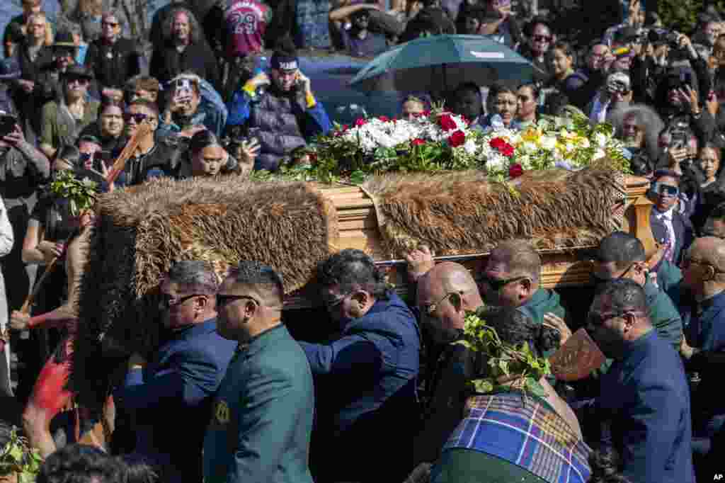 The coffin with the body of New Zealand's Maori King, Kiingi Tuheitia Pootatau Te Wherowhero VII, is carried up Taupiri Mountain for burial in Ngaruawahia, New Zealand.