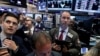 Traders work on the floor of the New York Stock Exchange (NYSE) in New York, May 18, 2017. 