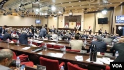 دیمەنی کۆبوونەوەیەک لە پەرلەمانی عێراق.