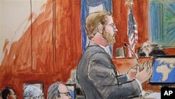 Assistant U.S. Attorney Nicholas Lewin, foreground, gives his opening statement to the jury in the trial of Ahmed Khalfan Ghailani, left, 12 Oct 2010