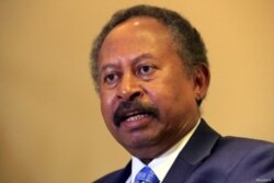 FILE - Sudan's Prime Minister in the transitional government, Abdalla Hamdok, speaks during a Reuters interview in Khartoum, Aug. 24, 2019.