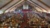 FILE - A mass in memory of Nelson Mandela takes place at the Regina Mundi church in Soweto, Johannesburg, South Africa, Dec. 2013.